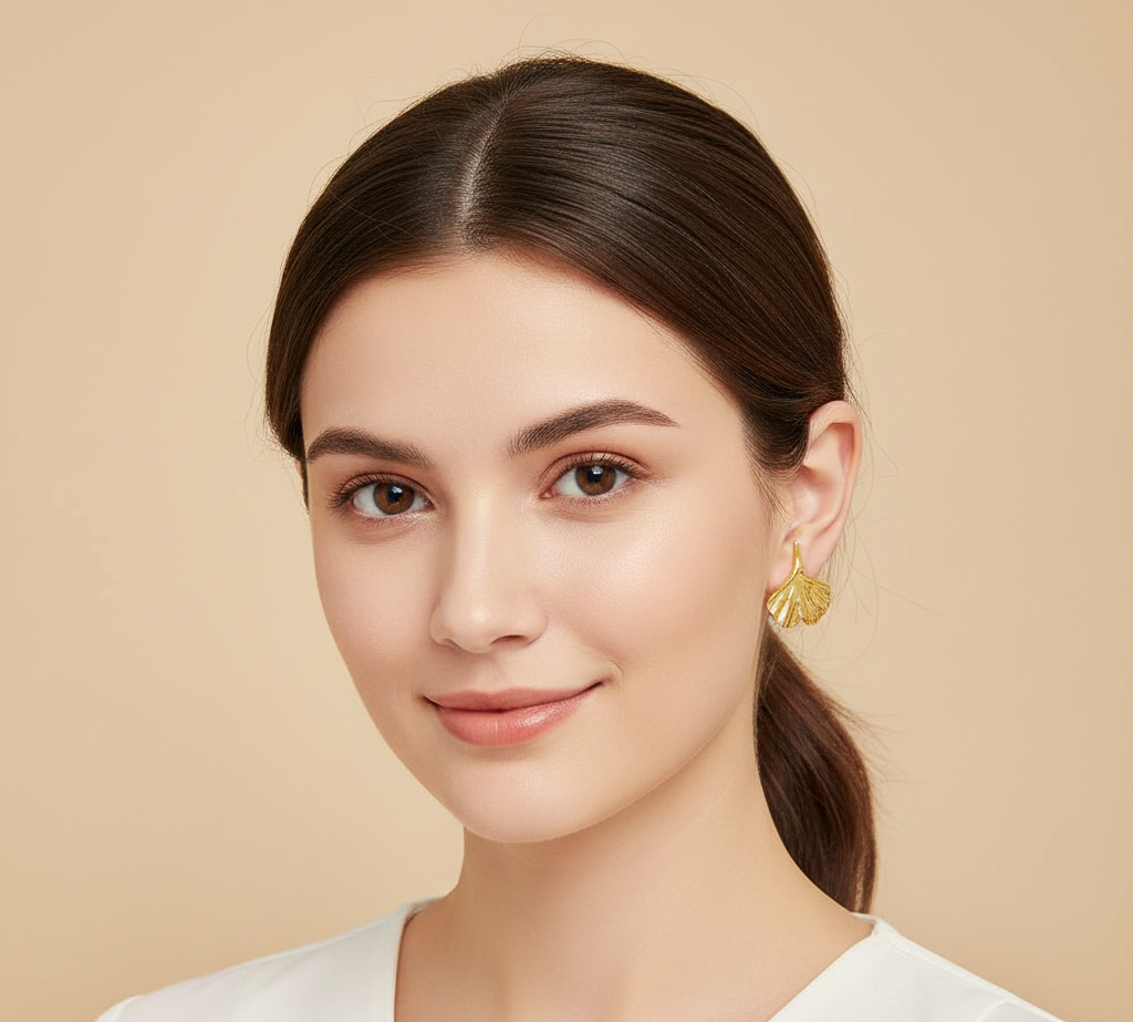 Second image of Elegant Hollow Leaf Stud Earrings Stainless Steel Electroplated Gold Finish