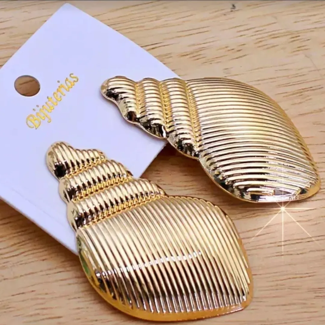 Second image of Gold Ribbed Conch Shell Stud Earrings