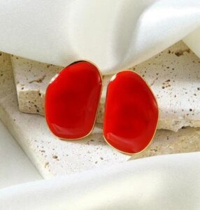 Marble Luxe Statement Stud Earrings feature a stunning marbled resin design framed with a sleek gold-tone border.