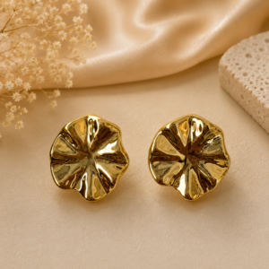 Floral sculpted gold statement stud earrings with petal-inspired design and mirror-polished finish. Suggested SKU