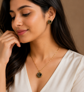 Luxury stainless steel white swirl pendant necklace and matching stud earrings set with gold-plated finish for women.