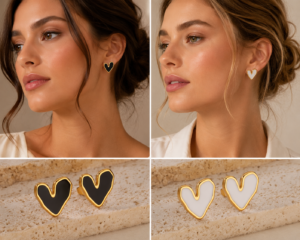 Woman wearing black & White heart-shaped enamel stud earrings with gold-tone border