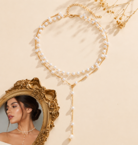 Luxury multi-layer pearl necklace with silver-tone accent beads and a crystal drop pendant displayed in an elegant flat-lay product photography setting.