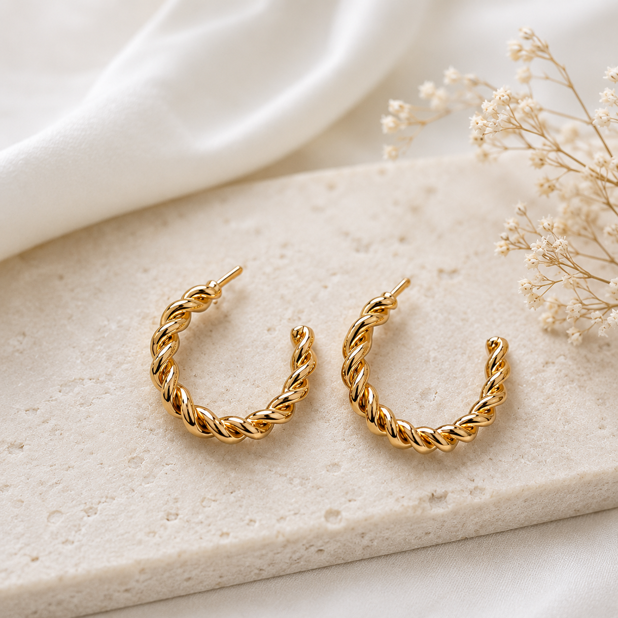 Second image of Gold Twisted Hoop Earrings