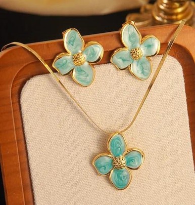 Second image of Gold Tone Flower Pendant Necklace & Matching Stud Earrings