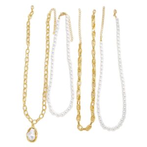 Woman wearing a luxury layered necklace featuring pearl strands, gold chains, and a baroque pearl pendant in a modern vintage-inspired design.