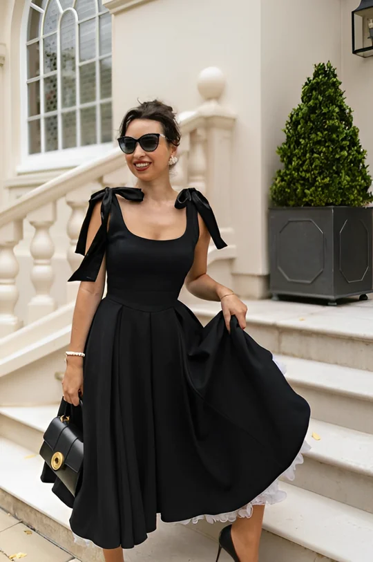 Second image of New Bow Frill Black Dress